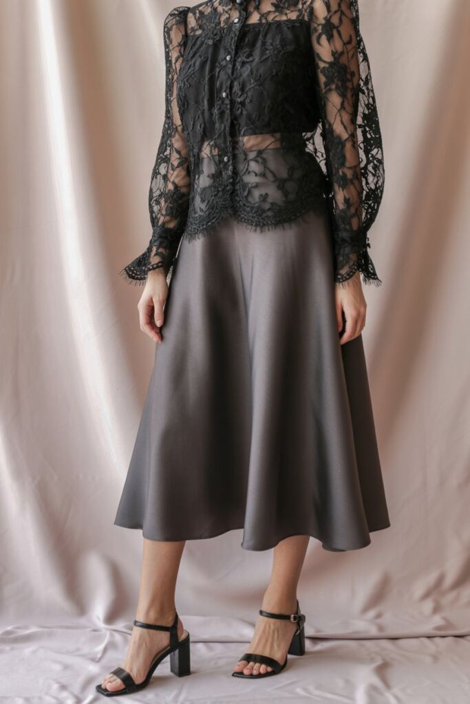 Victorian lace blouse with A-line midi skirt and block-heel sandals
